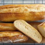Freshly baked Cuban bread with a crispy crust and soft interior